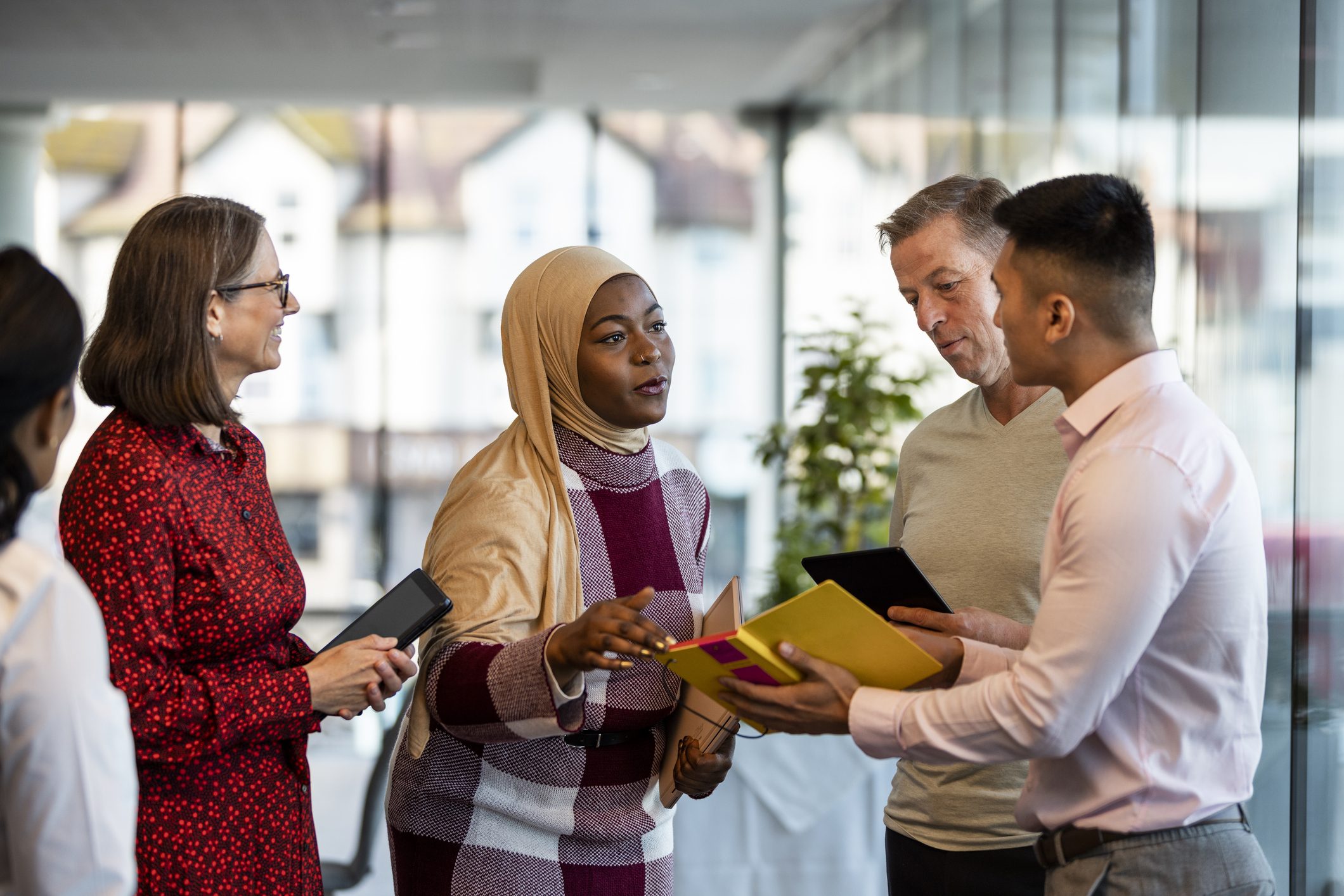 Diverse team exchanging views in an office