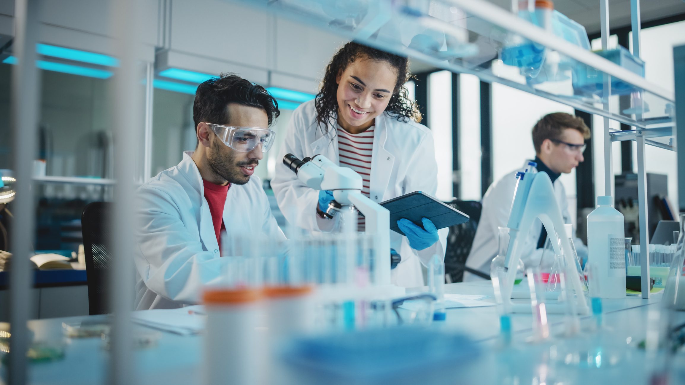 Researchers working together in a lab