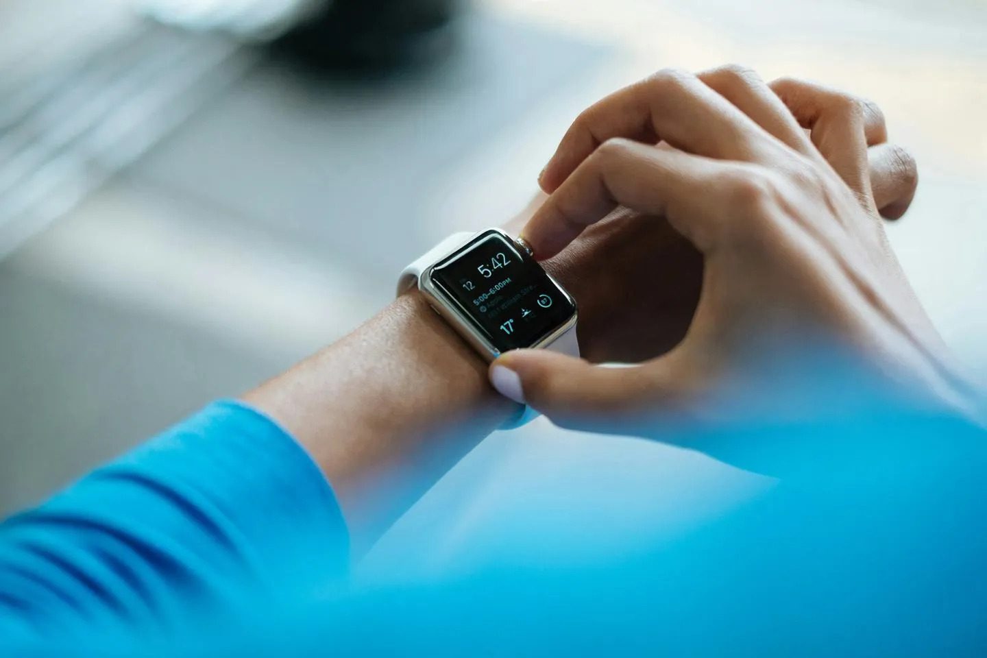 Person checking their smartwatch