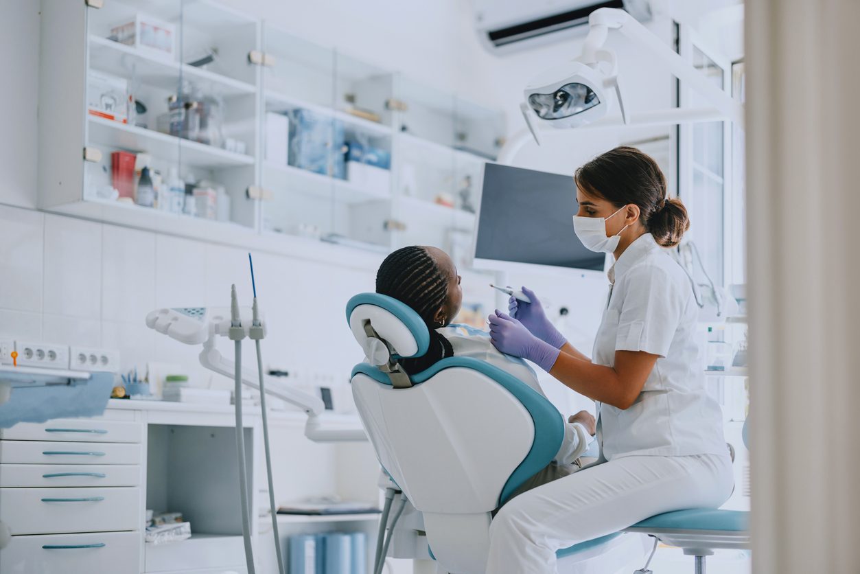 Black woman at a dentist appointment
