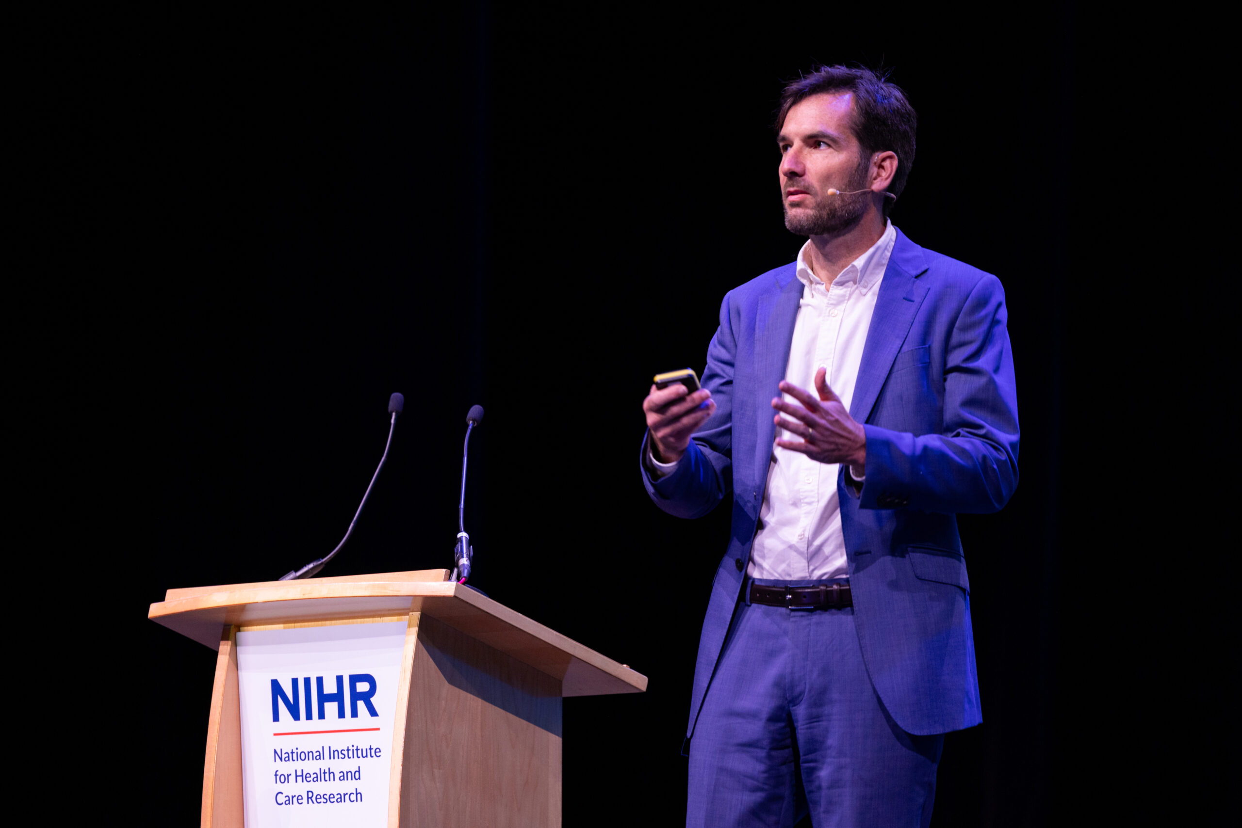 Prof Alastair Denniston on stage