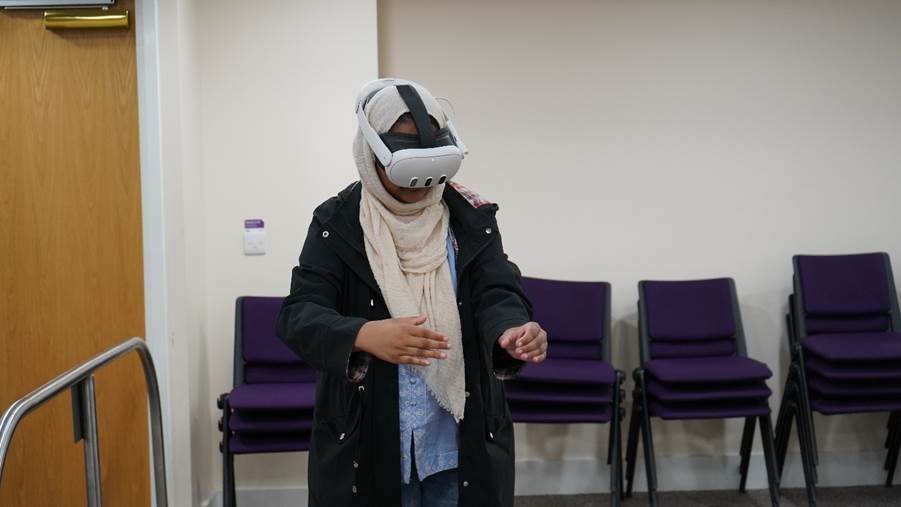 Secondary school student wearing VR headset