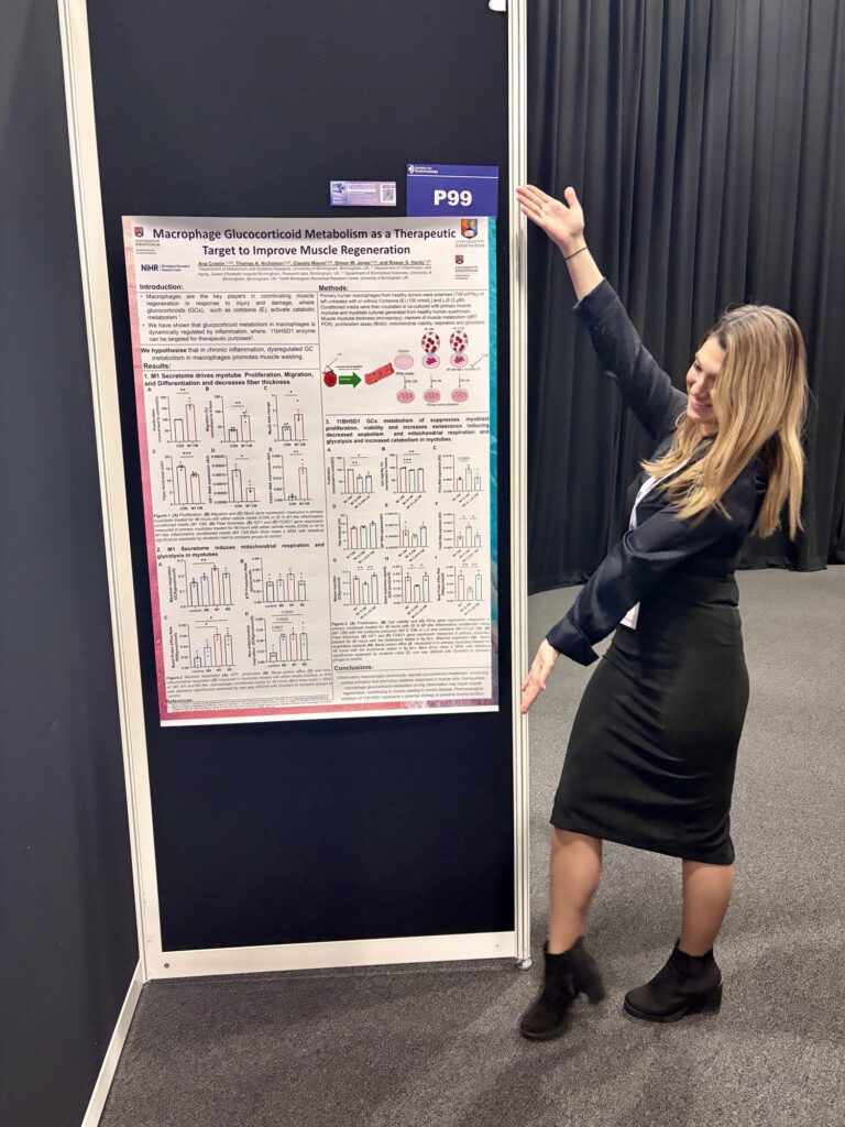 Woman standing next to her academic poster at a science conference, and proudly pointing at it