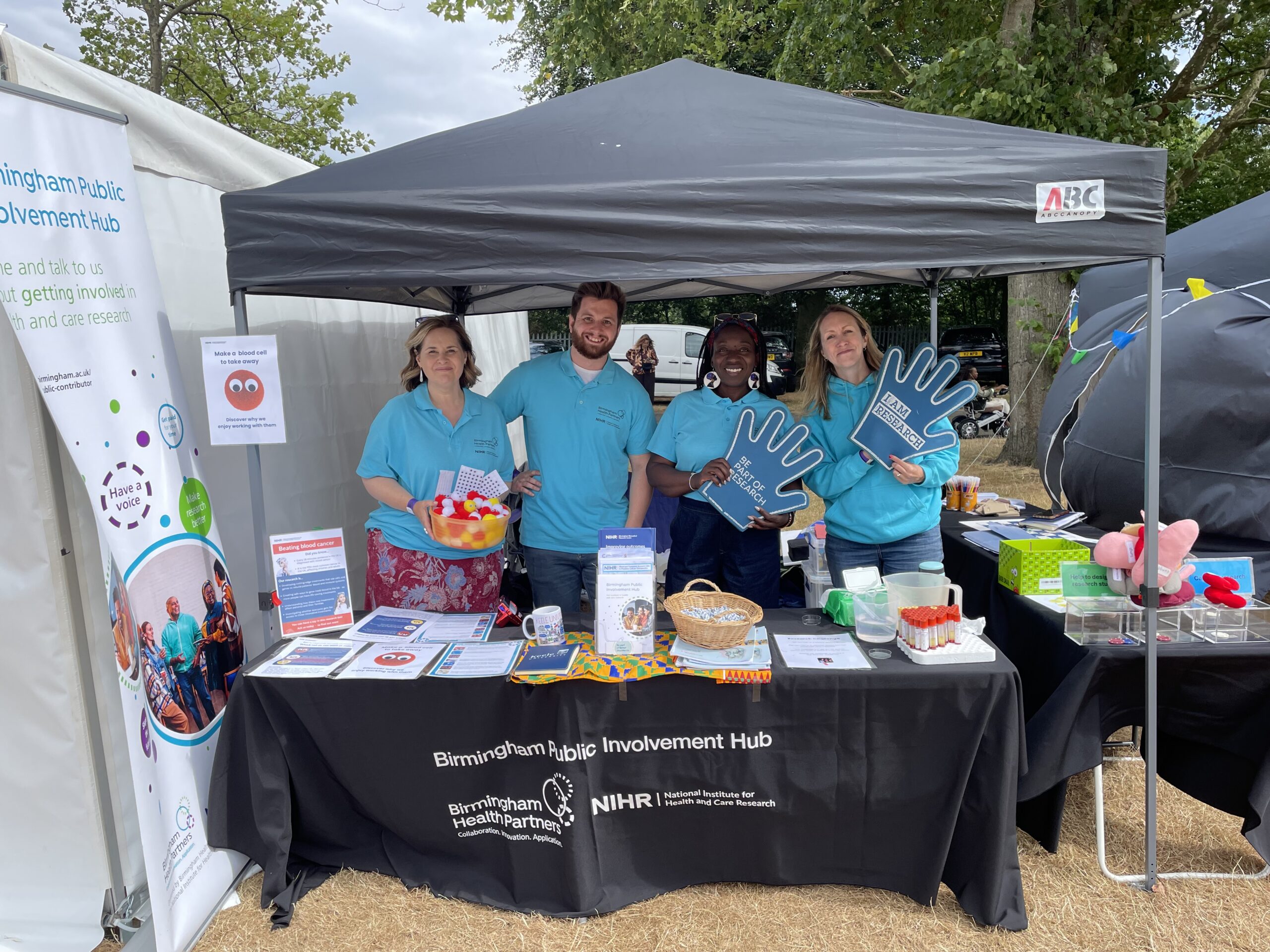 Public engagement team from the Birmingham Public Involvement Hub at a community event